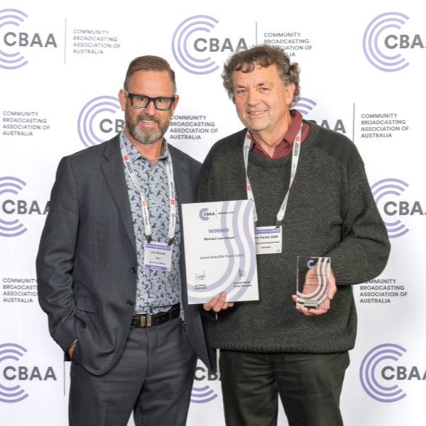 CBAA CEO Jon Bisset with 2025 Michael Law Award Winner Jim Parish